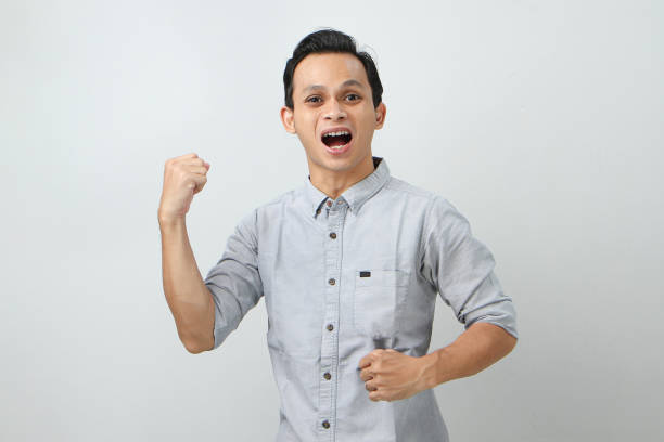 istock happy confident asian indonesian man on isolated background 2029721798