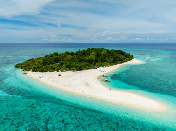 istock Tropical Island in Camiguin, Philippines. Mantigue Island. 2029727235