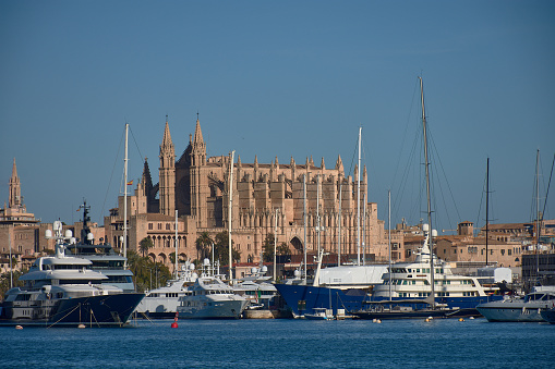 Palma, Spain, sailboats in the port of Palma de Mallorca, in the background the La Seu Cathedral