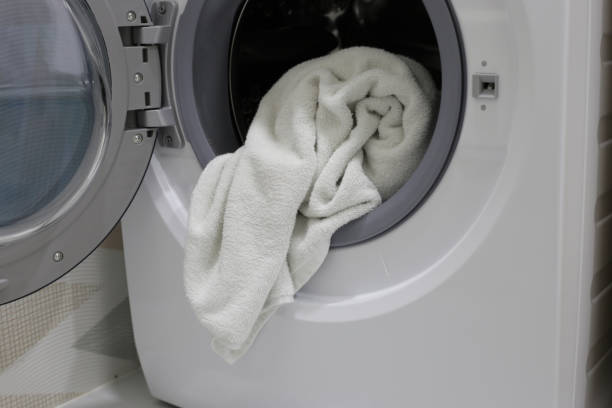 istock Used towel in washing machine 2029765522