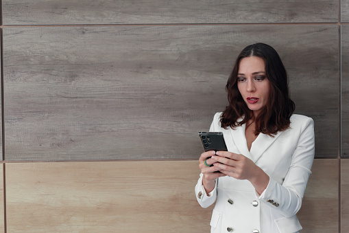 Woman is anxiously discussing business in the messenger