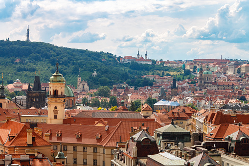 An aerial view of the rooftops of the historical buildings in Prague, Czech Republic