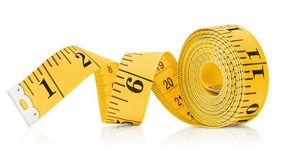 yellow sewing measuring tape on white isolated background