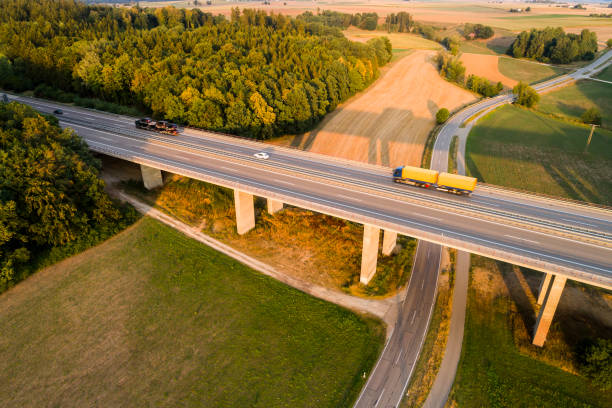 istock Elevated highway at sunset, aerial view 2029939529