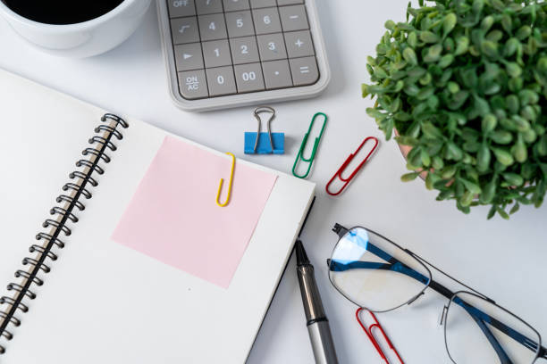istock A calculator, a wallet, and a laptop computer on the work desk 2029944340