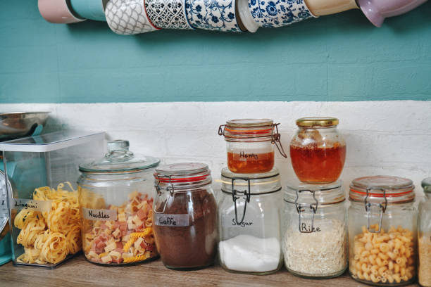 Organzing Kitchen by Storing Dry Foods in Glass Containers