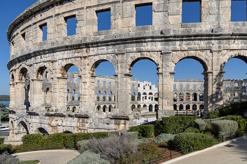 Pula, Croatia, Istria - September 29, 2023: Monumental Roman amphitheatre Pula Arena, built of limestone in ancient times