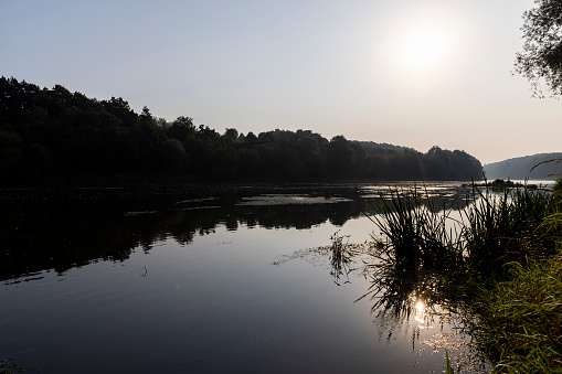 The river during the dawn in autumn , the waves on the river during the sunrise of the sun in the autumn season