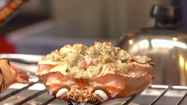 View of crab grilled on a charcoal brazier
