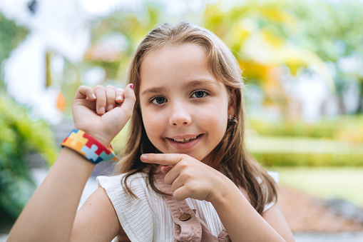 Autistic girl child autism symbol bracelet