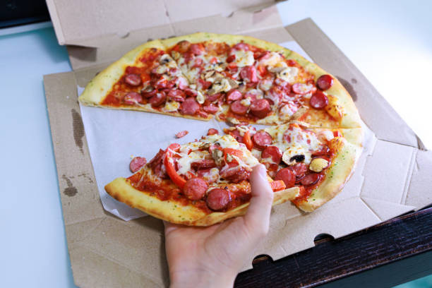 istock Sausage and cheese pizza. 2030035279
