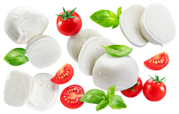 istock Buffalo mozzarella with slices, basil leaves and tomatoes cherry isolated on a white background. Traditional Mediterranean food. 2030067488