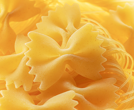 Italian pasta farfalle close-up. Food background.