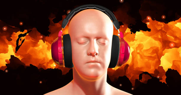 An alternative-looking redhead man standing on the balcony and listening to music