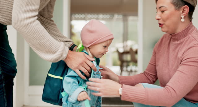 Child, parents helping with backpack for kindergarten, hug at home getting ready and happy family support in morning. Mom, dad and kid with school bag for daycare, learning and development with love.