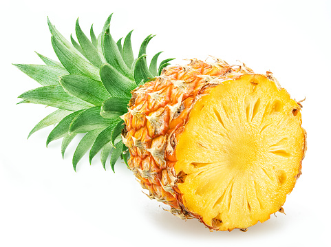 Ripe pineapple  and pineapple slices isolated on white background. File contains clipping path.
