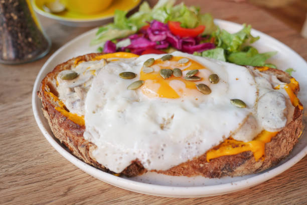 istock Avocado egg sandwich served with salad on a plate 2030121127