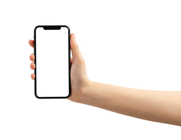 istock Hand holding the black smartphone with blank screen on white background, Clipping path. 2030126435
