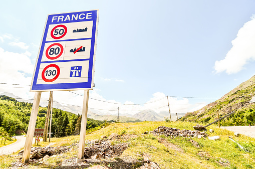 sign on road in mountains, photo as a background, digital image