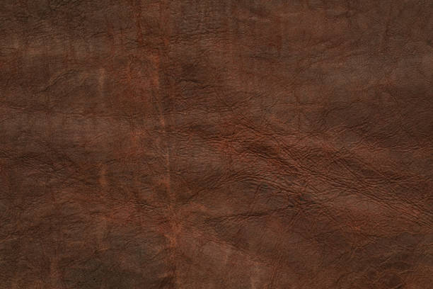 istock Close-Up Texture of a Brown Leather Surface Showcasing Fine Details 2030131323