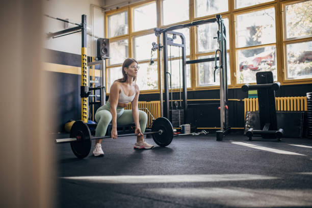 istock Woman weightlifting 2030154447
