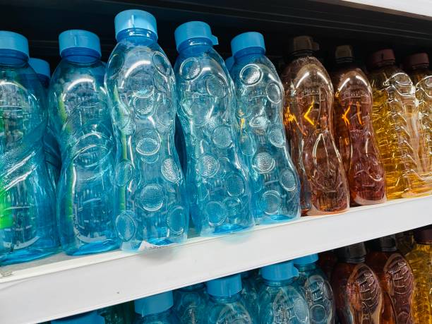 istock Plastic water bottles kept in rack for sale 2030171820