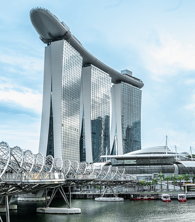 Singapore, 26 January 2024: Marina Bay Sands. Singapore symbol, stands proudly in skyline of Marina Bay. striking architecture, with three connected towers and unique rooftop, iconic landmark