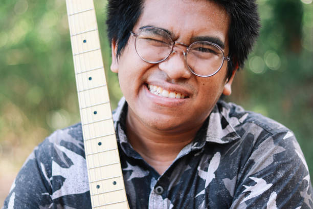 istock Thai happy male musician 2030195256