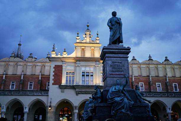 istock Statue on the main square of Krakow in the evening 2030206058