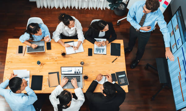 istock Multi ethnic diversity business people and modern business project. Habiliment 2030210321