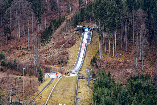 Ski jump at ski resort of Swiss mountain village of Engelberg on a winter day. Photo taken February 21st, 2024, Engelberg, Canton Obwalden, Switzerland.