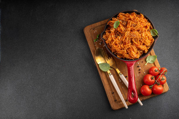 istock Mafaldine pasta with bolognese tomato sauce 2030218936