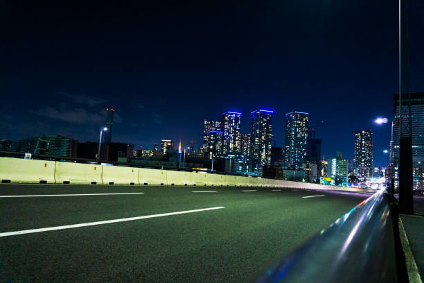 istock Urban night view and asphalt road 2030219460