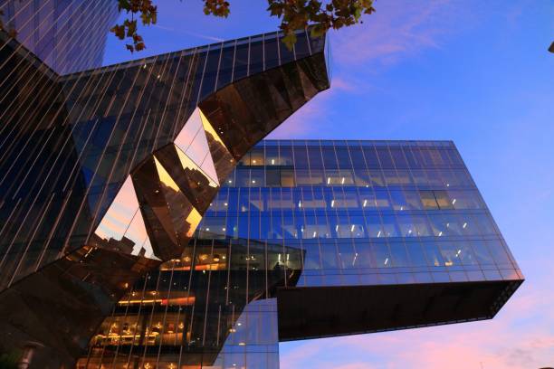 Gas Natural Building modern architecture in Barcelona. The building is also known as Mare Nostrum Tower. It is headquarters for Naturgy natural gas utility company.