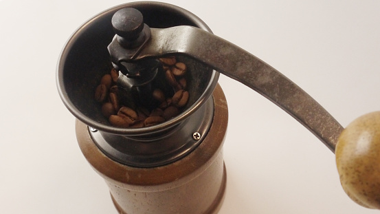 coffee grinder on wood table for coffee hot drink concept