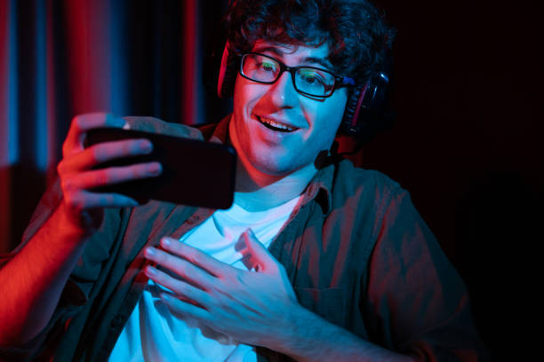 istock Stressful streamer team playing with Esport on phone with harder game. Gusher. 2030248271