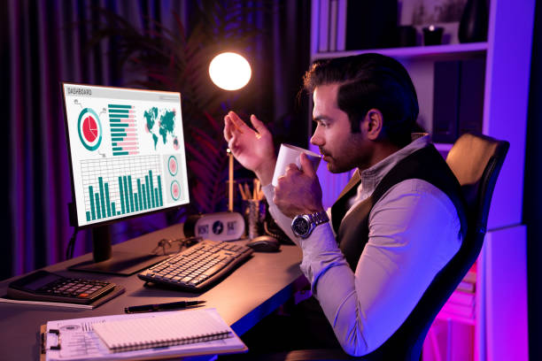 istock Smart businessman meeting product database while holding coffee cup. Surmise. 2030281262