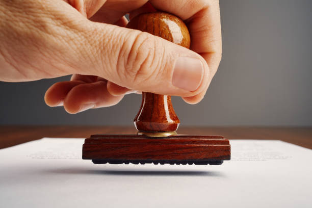 istock Old wooden office hand stamp on desk 2030284410