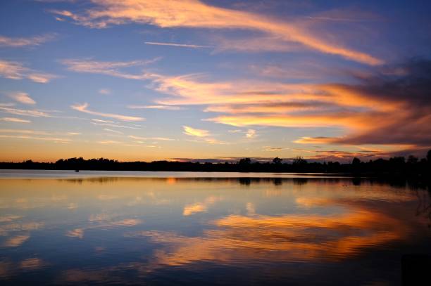 istock Reflection of sunset sky at the lake 2030286550