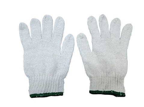 A white glove with a green stripe on the wrist. The glove is made of cotton and is designed for use in construction, gardening, and other general work applications.