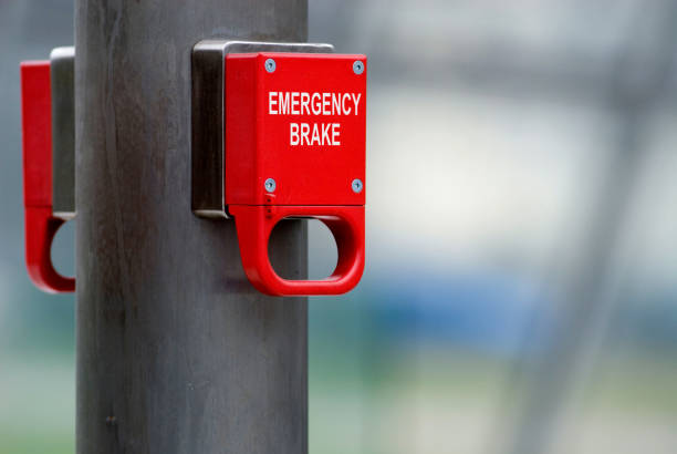 Red SOS emergency light and siren at ceiling of pedestrian footbridge at Vibhavadi Rangsit Road in Bangkok Chatuchak