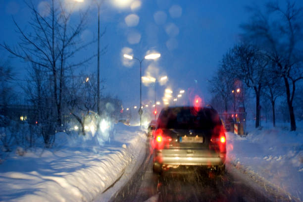 istock Poor visibility through the windshield in rain and snow, Munich, Bavaria, Germany, Europe 2030314783