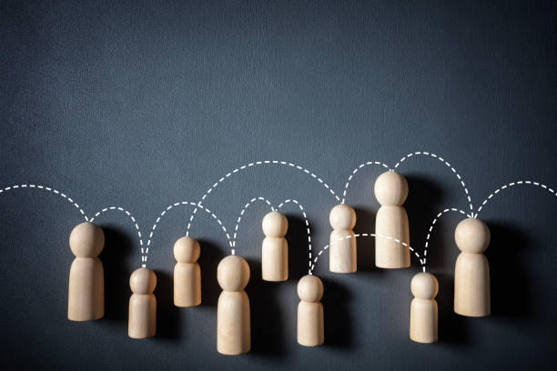 istock Networking and social media wooden people teamwork and support network concept 2030315898