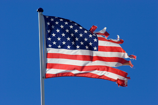 torn US American Flag