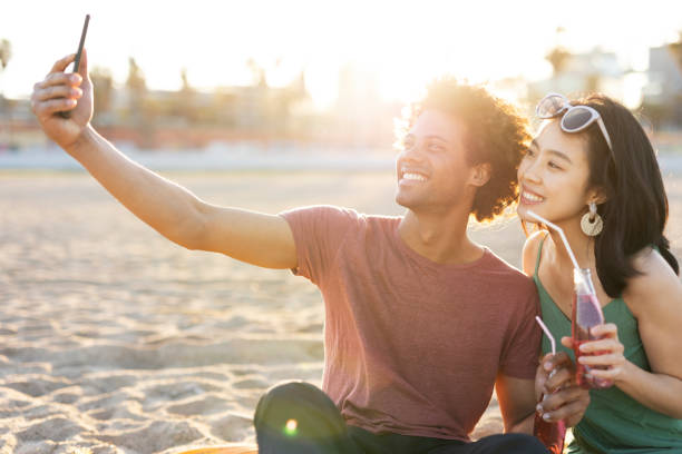 istock Beautiful young couple enjoy at the beach 2030347389