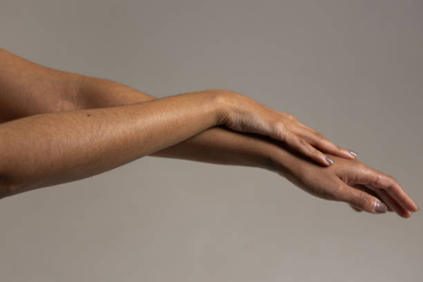istock Woman moisturising hands 2030352530