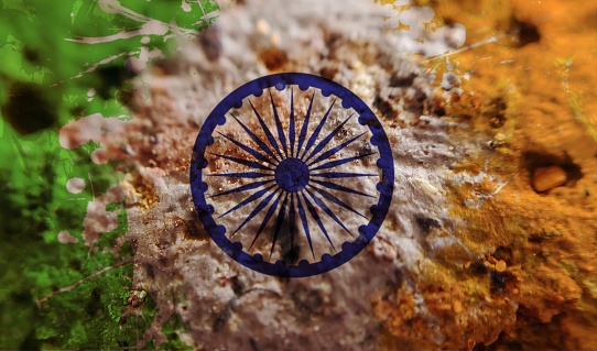 The Macrophotography of The art image of India national flag pinned on rough object