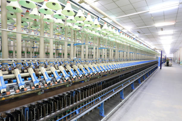 istock The workers are working hard on the spinning line, North China 2030375860