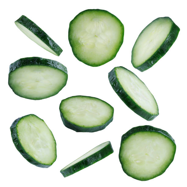 istock set of flying slices cucumber isolated on white background 2030379767