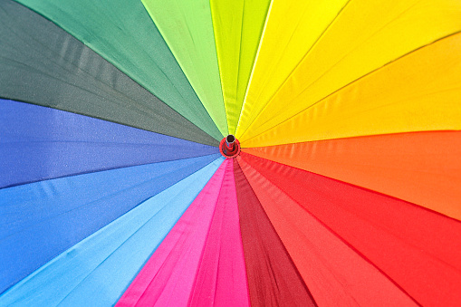 Many colors umbrella focused on completely isolated. Image for background